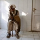 An elderly man waits to be seen by a doctor in the Emergency Room of the Bost Hospital. Kate Holt.
