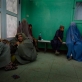 Burka clad women and their children sit in the waiting room of Mirwais Hospital. Kate Holt.