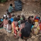 Children attend school which is held under a thorn tree in the woreda of Geega, near Logya. Kate Holt.