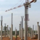 A crane and construction workers stand on the site of the new Juba Airport in Juba Southern Sudan. Kate Holt.