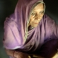 Hamida is around 70 years old and nearly blind. She is a widow and lives alone in a small shed. Kate Holt.