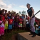 Katy Perry pumps water at a water point on a visit to a primary school that has been rebuilt by UNICEF. Kate Holt.