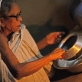 Shunda Bala washes up in the family's kitchen "I find it hard to do housework now". Kate Holt.