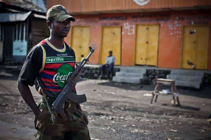 M23 rebel soldiers patrol in the town of Sake that they seized from Congolese Government soldiers. Kate Holt.