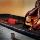 A woman sits next to her son who is suffering from acute dysentery in hospital in South Galkayo, Somalia. Kate Holt.