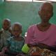 A mother and her children in Nyunzu hospital who fled her village following a series of brutal attacks. Kate Holt.