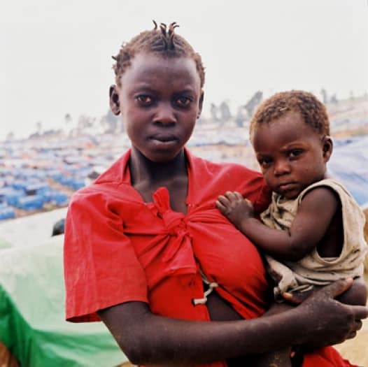 A girl and her baby in the IDP camp in Bunia. Kate Holt.