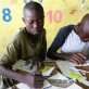 Boys from Don Bosco prepare their entries for the competition. Kate Holt.