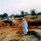The main road through Krindig Camp, Darfur, where Helpage are working. Kate Holt.