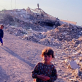 Children play in the ruins of the Baath Party headquarters in Nazariyah. Kate Holt.