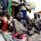 A family who has been displaced by tribal clashes in Pinga-and travelled three days by foot to Merikyo town. Kate Holt.