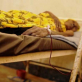 Kusanza lies in the infectious disease unit of Juba hospital receiving a blood transfusion. Kate Holt.