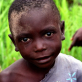 A young boy who is a beneficiary of the IRC"s water projects in Kalemie, Katanga. Kate Holt.