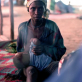 A woman and her child who have been displaced by renewed fighting on the outskirts of Monrovia. Kate Holt.