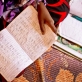 Sarah Mowlid Mohammed does her homework at her home  in the Shabelle IDP settlement in  Garowe, Somalia Tuesday. Kate Holt.
