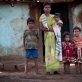 A woman who has decided, with her husband to use family planning, poses for a photograph. Kate Holt.