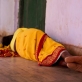 A woman sleeps on the floor in Kolibera health centre near to Ranchi, India Friday, May 30, 2014. Kate Holt.